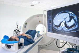 Image That Showing A PET Scanner Scanning A Patient.