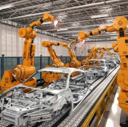 Industrial Robots Working In Automobile Industrial Sector.