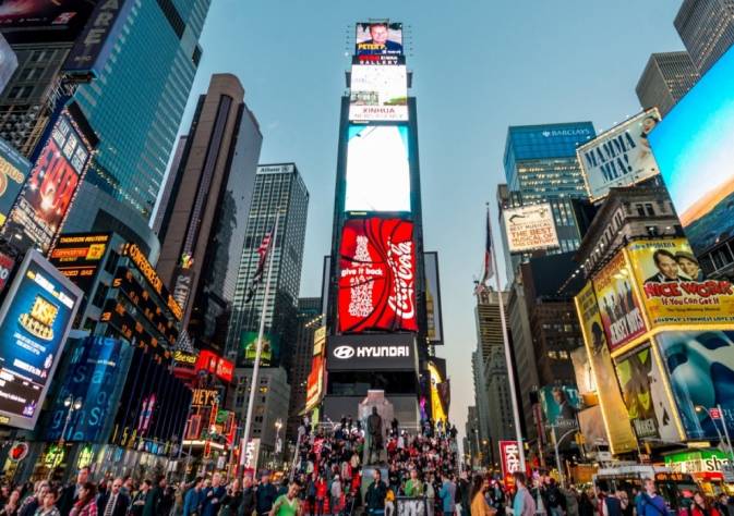 The Bright & Huge Electronic Coca-Cola 3D Digital Billboard Advertising In A Beautiful Night View of Times-Square Central And Main Square of New York.