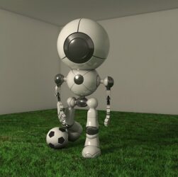 In An Indoor Room Robot Is Getting Ready To Kick The Football